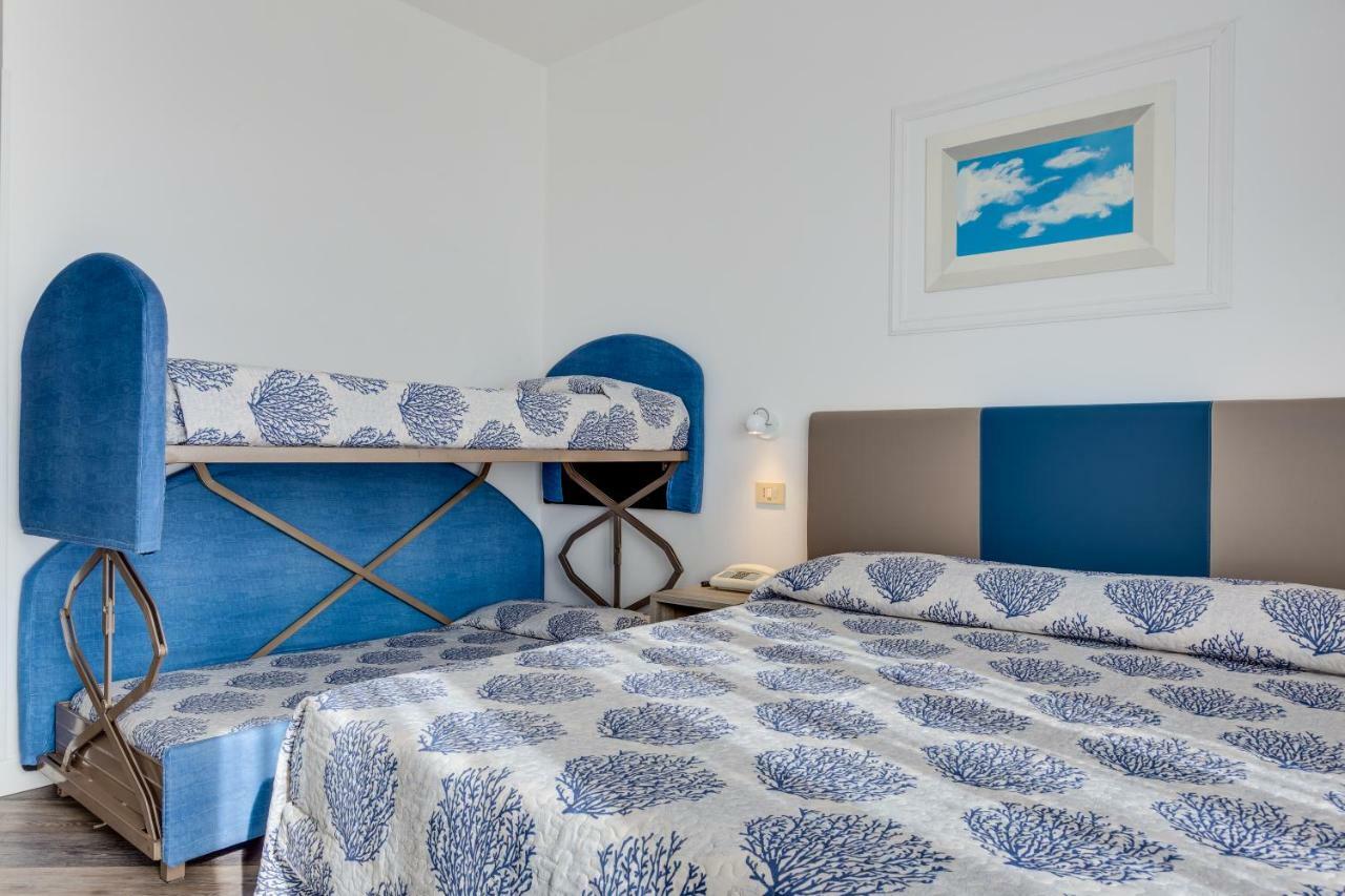 לידו די ג'סולו Hotel Manila חדר תמונה